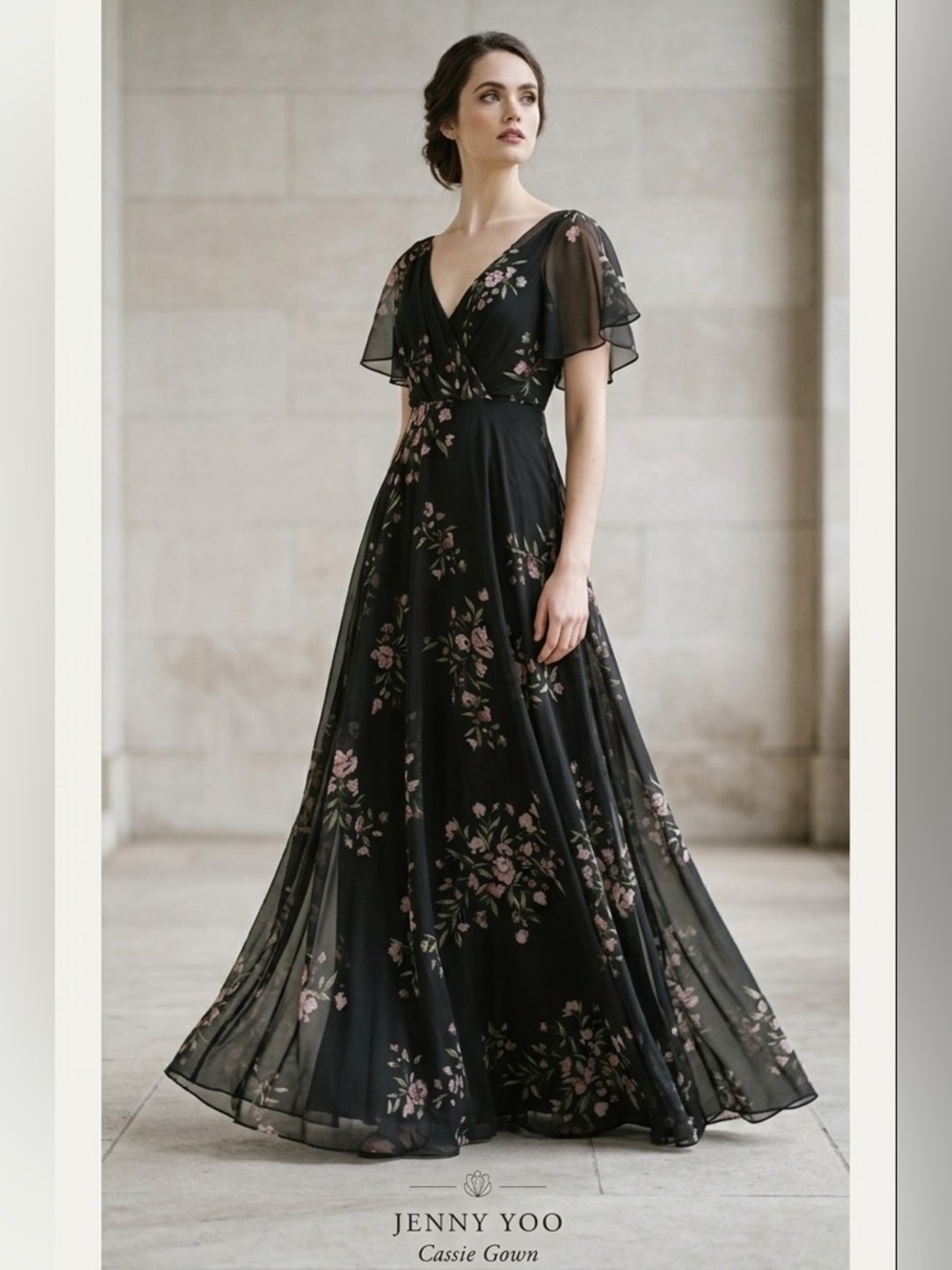Jenny Yoo Cassie
Flutter Sleeve
Surplice Gown
Black with Floral Pattern. - Picture 3 of 16